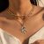 Simple multi-element retro jewelry with twist chain tassel rhinestone dragon pendant alloy necklace for female party gifts